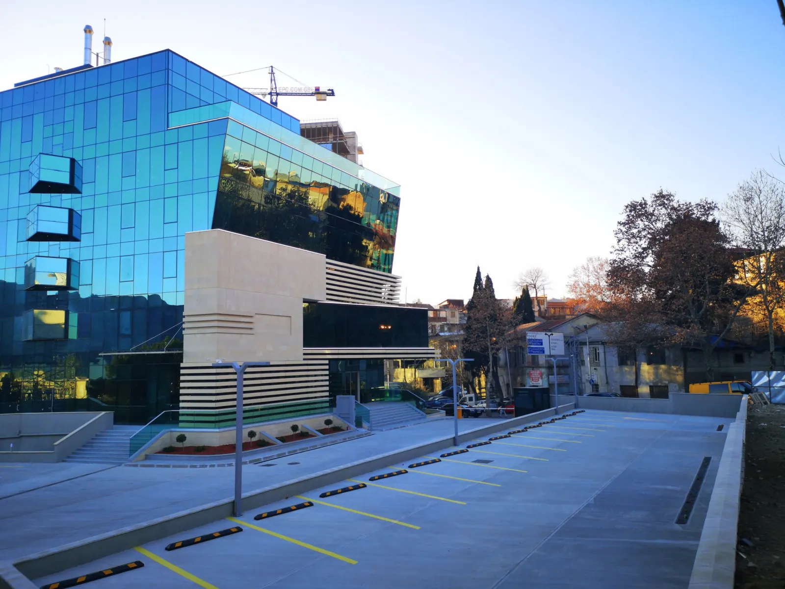 Tbilisi Business Center (Exterior) — Wide-angle street view of completed business center in Tbilisi context